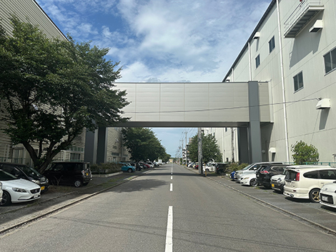 Overpass installed between warehouses